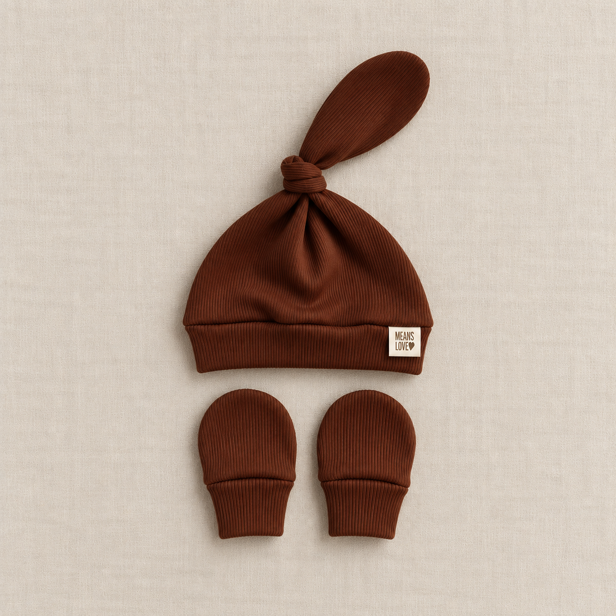 Conjunto_Bebe_Marrom_em_Trico.png