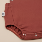 Salopete/Romper Bebê e Infantil Unissex – Algodão Premium Liso | Terracota