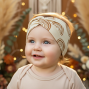 faixinha tiara de cabelo bebe estampa exclusiva arco iris marrom fundo bege 2