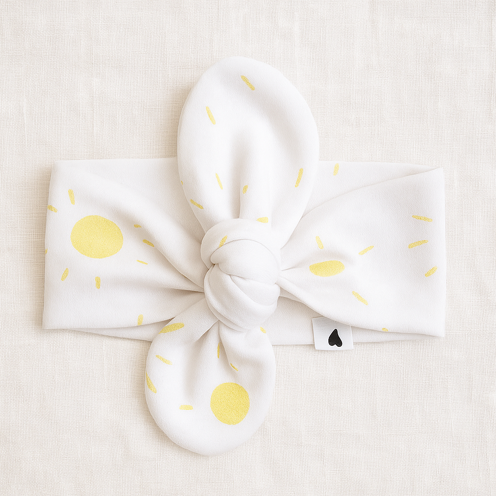 laco-cabelo-bebe-infantil-algodao-stretch-premium-solzinhos flat lay