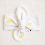 laco-cabelo-bebe-infantil-algodao-stretch-premium-solzinhos flat lay